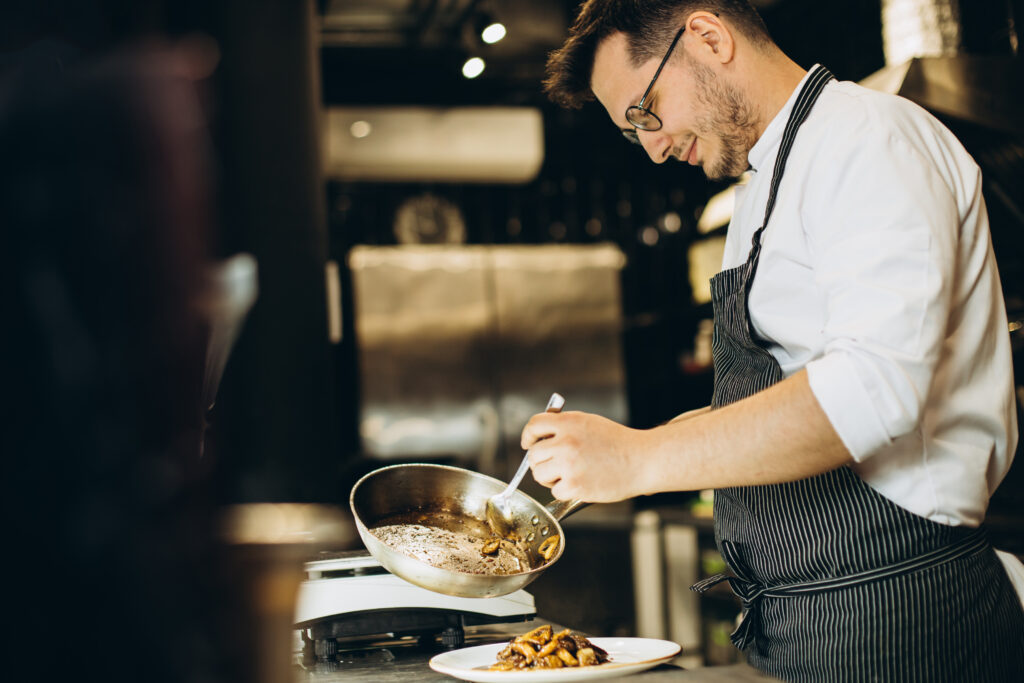 a chef cooking a dish